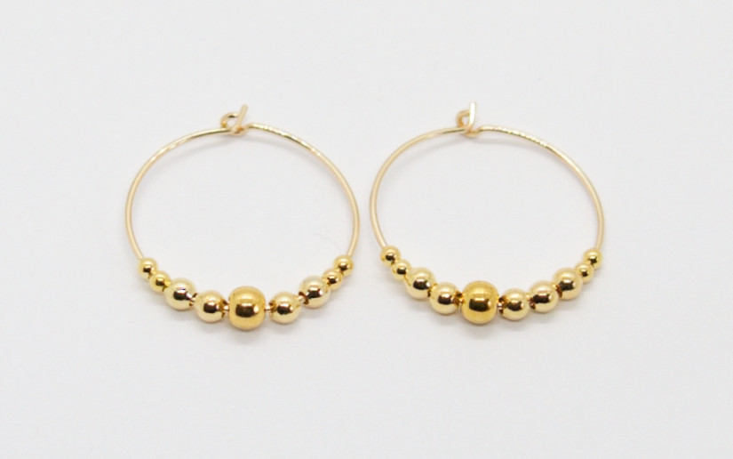 Goldene Creolen mit Gold-Perlen